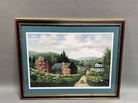 Front view of framed lithograph showing full artwork, matting, and frame