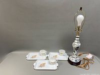Full lot view with lamp, trays, cups