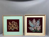 Both framed glass paintings side by side showing size and framing