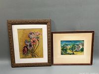 Both framed watercolors side by side