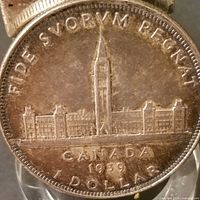 Reverse view showing Parliament Buildings, date and motto