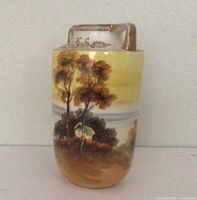 Full view of cylindrical Nippon vase showing painted landscape and gradient colors