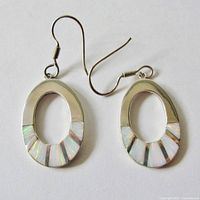 Front view of both oval sterling silver earrings showing opal inlay detail