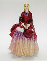 Front view of Paragon Lady Camille figurine showing full attire and colours