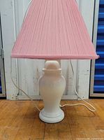 Full view showing lamp with shade front