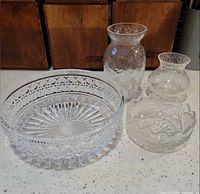 All four pieces displayed: large cut bowl, two mosaic vases, small cut bowl