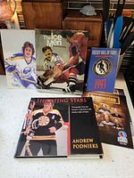 All five items standing and laid out for size and cover identification