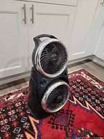 Front view of Honeywell dual-head tabletop fan showing overall design and chrome rings