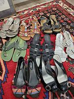 All eight pairs arranged on rug