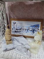 Group shot of all five items on wicker shelf