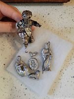 All six pewter nativity pieces grouped