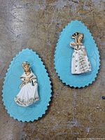 both plaques front view showing design and scale