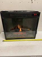 Front view showing flame effect, size tape, overall condition