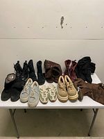 Overview of all footwear and gloves on table