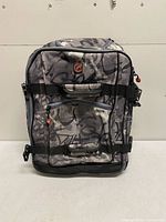 Front view of rolling backpack suitcase