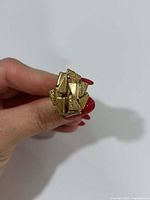 Front view of 10K yellow gold brutalist nugget ring