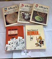 Group shot of all five books showing covers