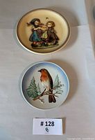 Front view of both Goebel plates