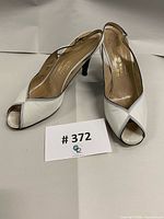 Full view of both shoes showing design and branding