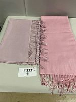 lilac and pink pashmina scarves side by side