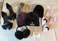 Overview of two pairs Native bow flats, five toques, earmuffs