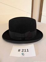 Front view of black Borsalino homburg with lot tag