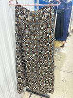 Full front view of patterned Emanuel Ungaro skirt on hanger