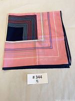 Folded scarf showing overall colour and Gim Renoir signature