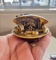 Open clam shell showing interior diorama details