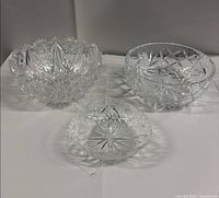 Three lead crystal bowls displayed together