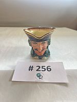 Front view of Royal Doulton Dick Turpin Toby mug showing facial details