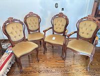 Four Victorian style chairs front view