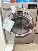 Full front view showing metallic body, clear door and model tag