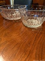 Two cut crystal bowls showing pattern and size comparison