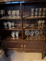 Cabinet interior showing shelves and lower storage