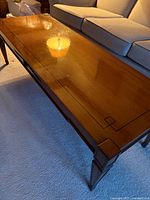 Angled view showing legs and finish