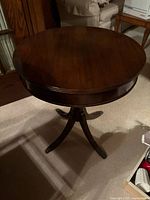 Full view of round pedestal side table