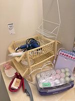 Overview of all items including shelf organizer, wire rack, hair tools, hot rollers, ceramic soap dish