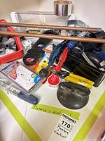 Overview of lot with pipes, fittings, tools, packaged outlet