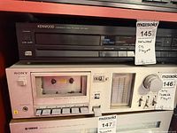 Front view of Sony TC-U30 deck in shelf showing full faceplate, controls and cassette window