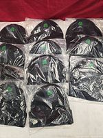 All 12 packaged beanies arranged