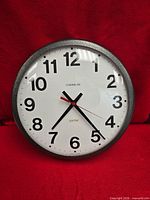 Front view of CHAIMILAN wall clock showing dial and frame