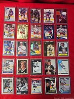 Full layout of 25 Wayne Gretzky cards in top loaders