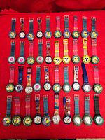 All 40 Gitano watches arranged in 5 rows on red background