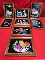 Group view of all eight framed foil pictures