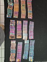 Overhead view of multiple stacks of Yu-Gi-Oh! cards on table