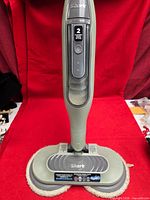 Front view of Shark Steam & Scrub steam mop showing control panel and pads