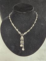 Full view of necklace on display bust