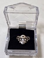 Ring in clear hinged presentation box, showing top view