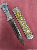 Dagger and sheath side by side